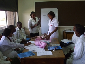 Dr Grace Irimu (standing left) with medical students from Nairobi University